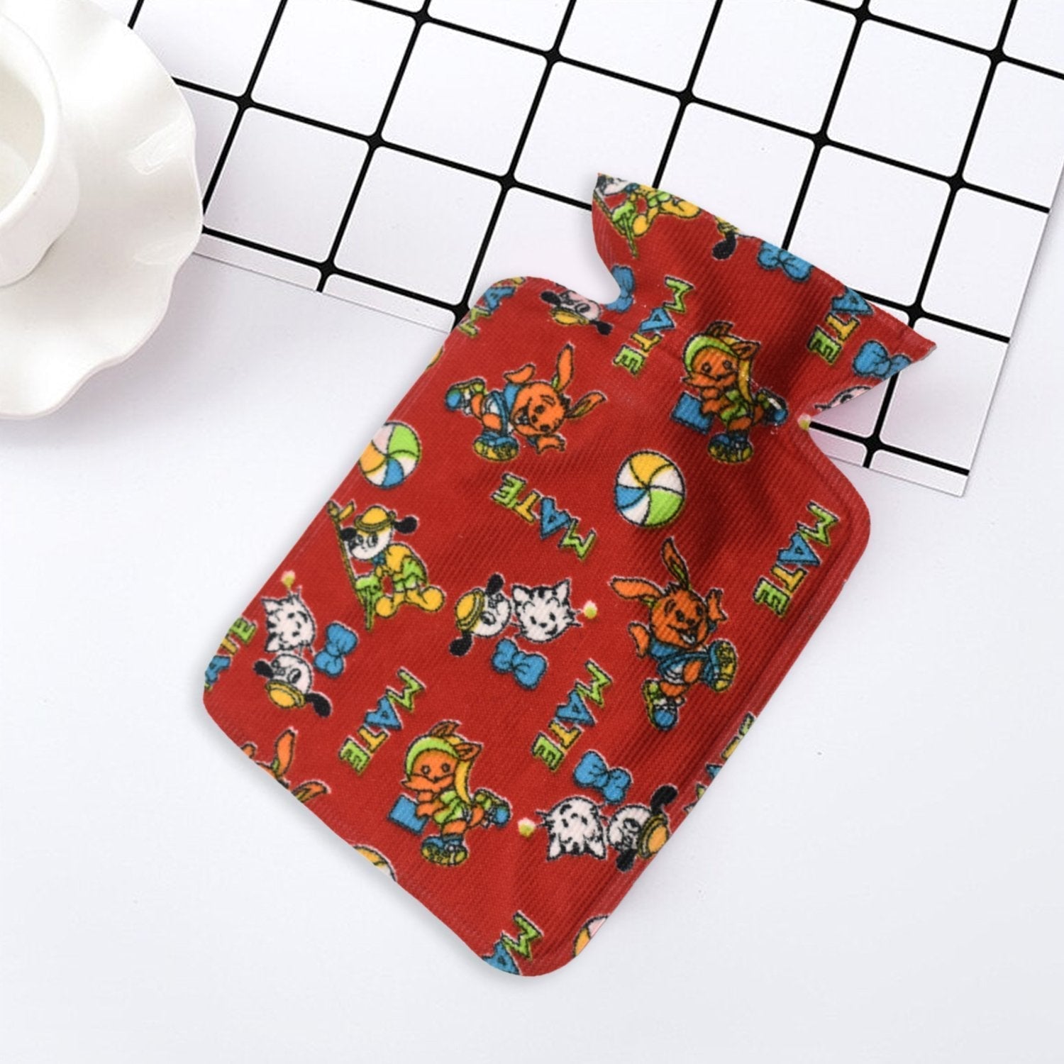 Small rubber hot water heating pad for pain relief. Small rubber hot water heating pad for pain relief.